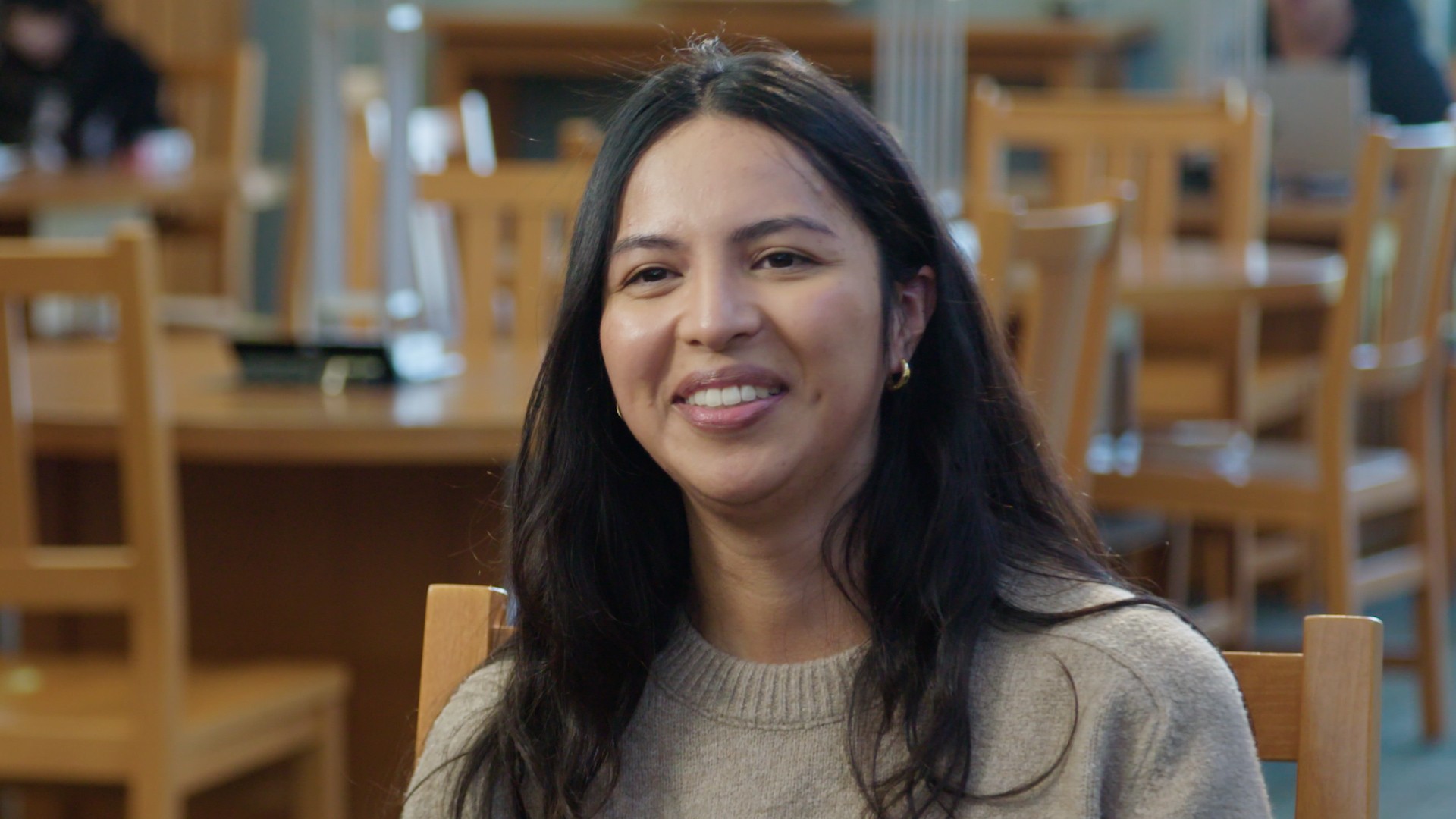 woman talking in the library