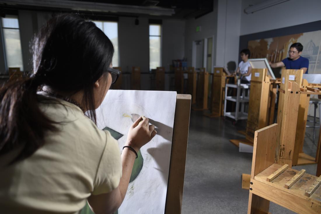 Art student working on a drawing