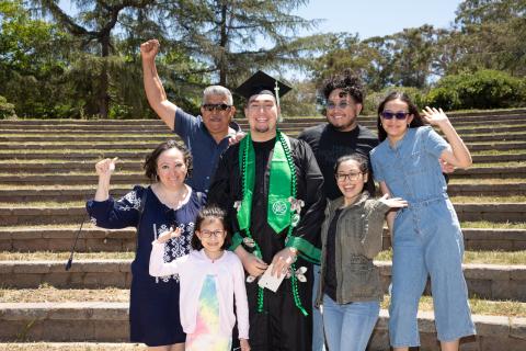 Family members cheering on graduation day