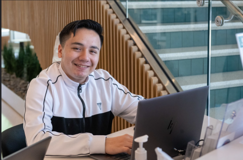 student ambassador with laptop